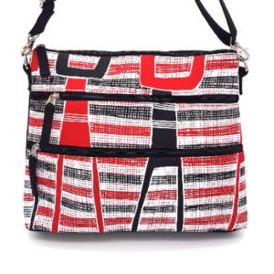 Charlotte bag made with hand printed Bottles fabric designed by Robyn Djunginy from Bula'bula Arts in Raminging and made by Flying Fox Fabrics