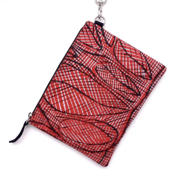 Nelly clutch purse bag with wrist strap, Billygoat Plum fabric designed by Susan Marawarr of Babbarra Designs in Maningrida, made by Flying Fox Fabrics